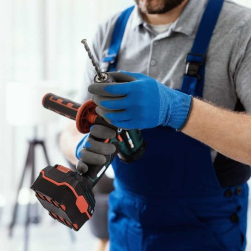 Professional handyman using a drill